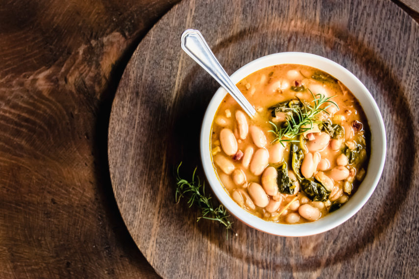 Italian White Bean Soup food photography on wooden table